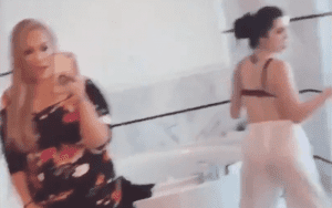 Watch Paige Entertain Nia Jax By Twerking In Mirror