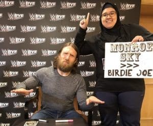 Daniel Bryan Reacts To Sign Saying The Miz’s Daughter Is Better Than His