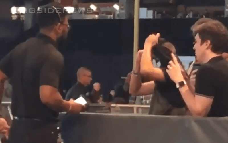 Footage Of Fan Forced To Remove AEW Merch At WWE Royal Rumble