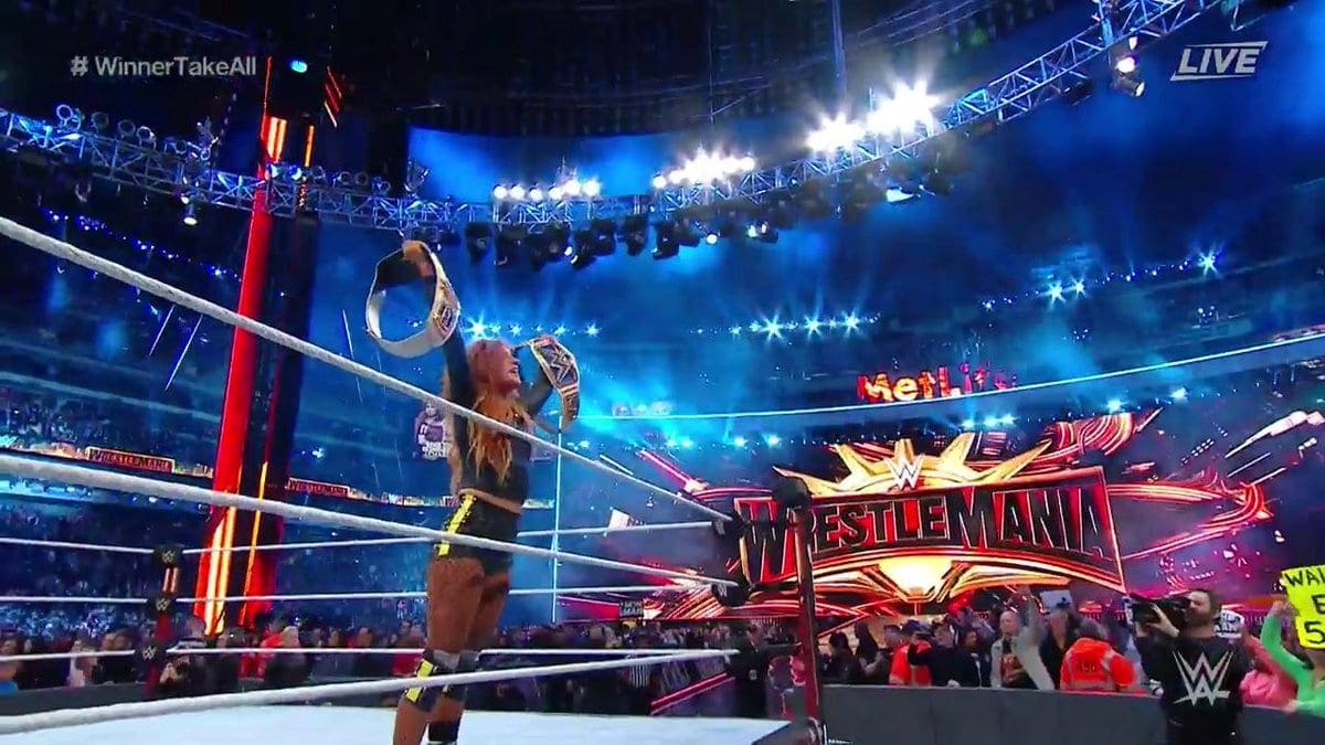 Becky Lynch Celebrates As WrestleMania Main Event Ends In Controversial Fashion