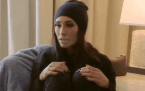 Carmella Sick & Asks Fans For Suggestions