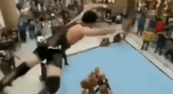 Indie Wrestler Makes INSANE Dive Off Mall’s Second Floor Balcony Into Ring