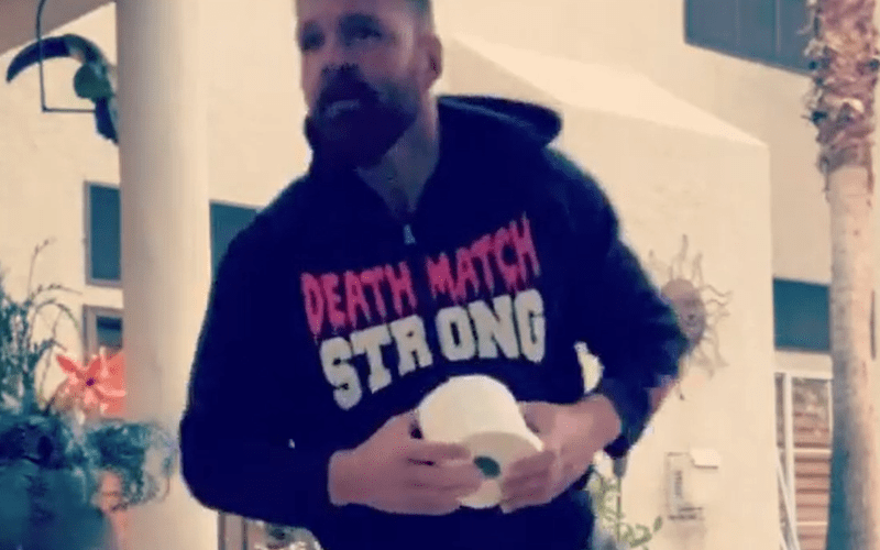 Jon Moxley Jumps Renee Young While Doing The Toilet Paper Challenge