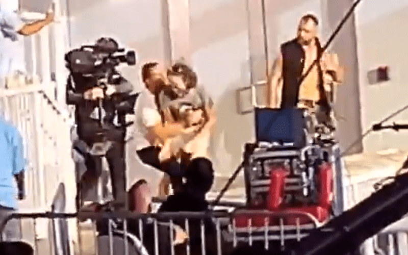 AEW Security Tackles Fan For Trying To Touch Jon Moxley During All Out