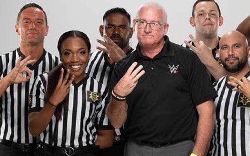 WWE NXT Referee Called Out For Giving White Supremacy Gesture In Company Photo