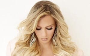 Charlotte Flair Says She's 'Back On Her Worst Behavior' With Scandalous New Photo