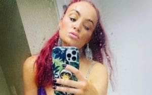 Maria Kanellis Stuns In Wet Purple Dress Selfie