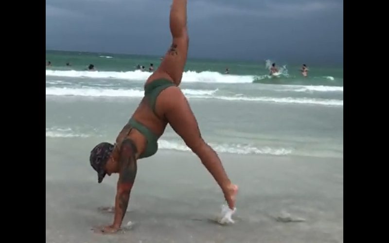 Lady Frost Shows Off Big With Bikini Handstands On The Beach