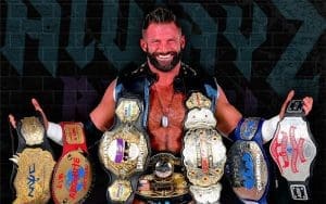 Matt Cardona Sends Photo Of Himself Wearing 7 Pro Wrestling Titles To Vince McMahon Matt Cardona Sends Photo Of Himself Wearing 7 Pro Wrestling Titles To Vince McMahon