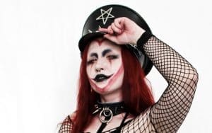 Abadon Straddles A Chair In Seductive Leather Photo Drop Abadon Straddles A Chair In Seductive Leather Photo Drop