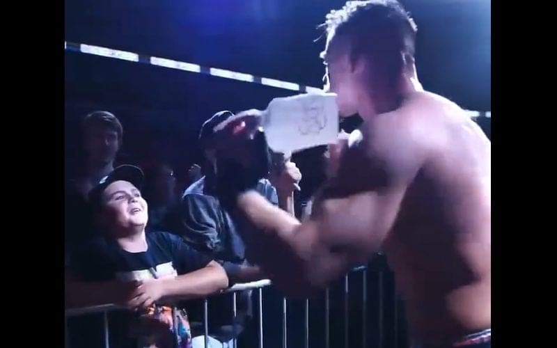 Austin Theory Says WWE Universe Sucks After Ripping Up Fan Sign