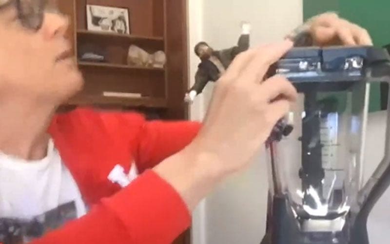 Johnny Knoxville Attempts to Obliterate Sami Zayn Action Figure Using a Blender