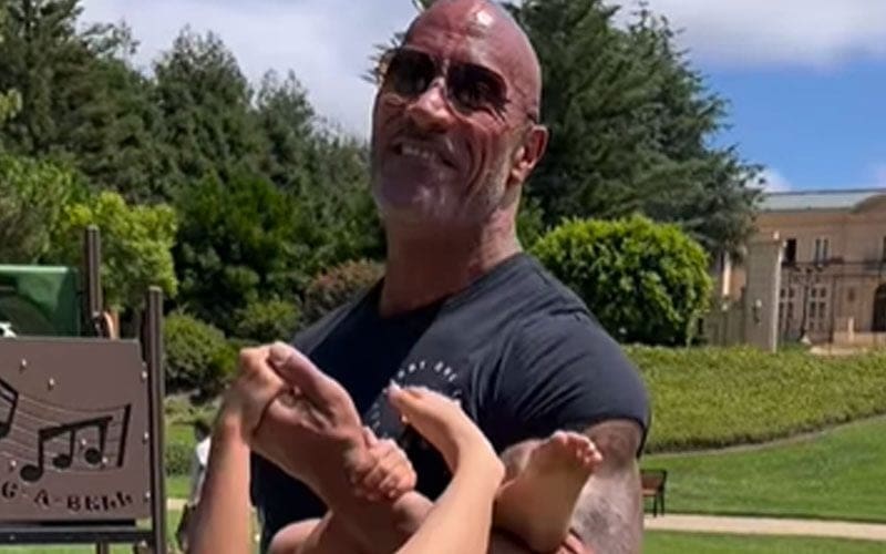 The Rock Flexes Doing Bicep Curls With His Daughter