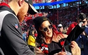 Bayley Gifts NFL Star with WWE Legacy Championship Title