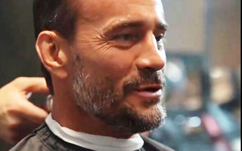 CM Punk Receives Haircut Backstage at 2024 WWE Royal Rumble Event