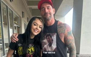 CM Punk Links Up with Cora Jade After ACL Surgery CM Punk Links Up with Cora Jade After ACL Surgery