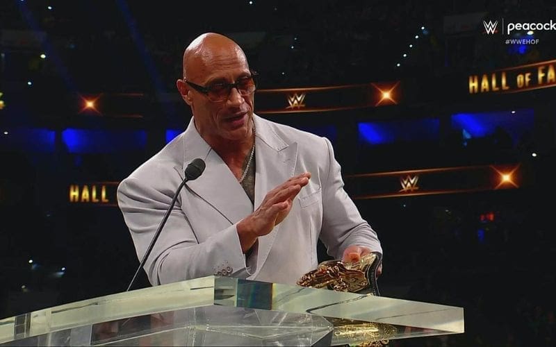the-rock-presented-with-special-peoples-championship-at-2024-wwe-hall-of-fame-30