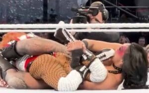 Unseen Angle Shows Rhea Ripley Biting Becky Lynch’s Foot at WrestleMania 40 Unseen Angle Shows Rhea Ripley Biting Becky Lynch's Foot at WrestleMania 40