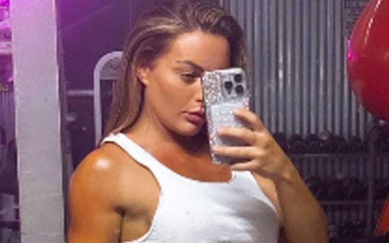 ex-wwe-star-mandy-rose-prepares-for-bodybuilding-competition-in-white-denim-shorts-gym-snap-13