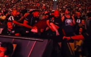 Footage of Security Dragging Fan Out of Arena During 5/11 AEW Collision Footage of Security Dragging Fan Out of Arena During 5/11 AEW Collision