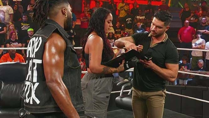 ava-agrees-to-ethan-pages-demands-during-contract-signing-on-64-wwe-nxt-03