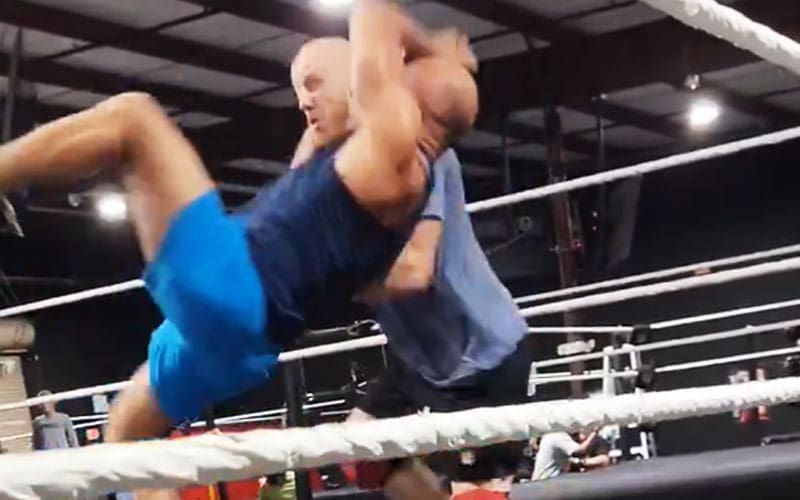 tommaso-ciampa-succeeds-in-hitting-rko-on-unsuspecting-talent-during-training-montage-33