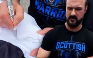 drew-mcintyre-gives-fan-nsfw-signature-to-bury-cm-punk-before-wwe-summerslam-04