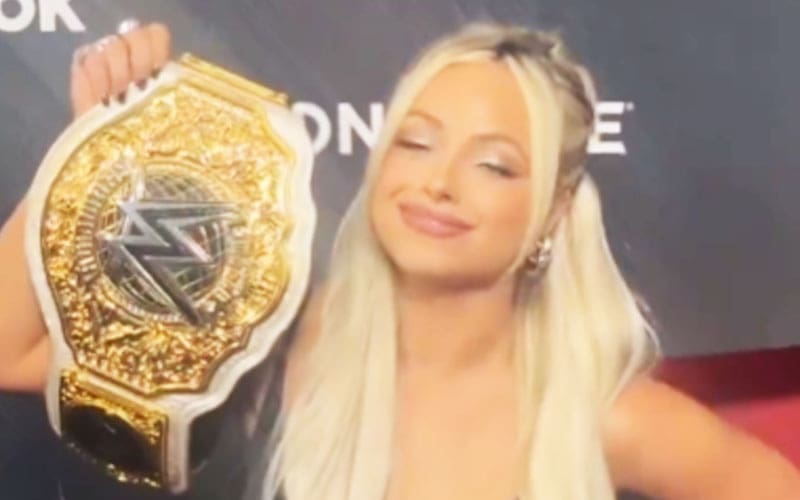 liv-morgan-flaunts-her-wwe-womens-world-title-at-crow-red-carpet-event-45