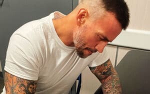 CM Punk Shares Behind-the-Scenes Photos of WWE Contract Signing with Triple H CM Punk Shares Behind-the-Scenes Photos of WWE Contract Signing with Triple H