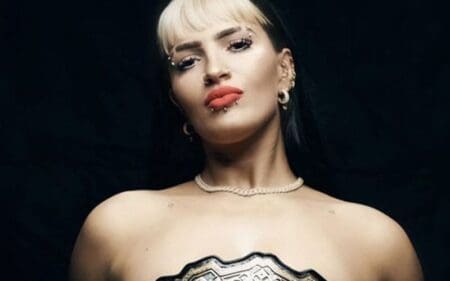 Steph De Lander Strikes a Bold Pose Wearing Nothing But Championship Gold