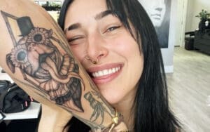 Rhea Ripley Dedicates New Tattoo to Her Beloved Dog