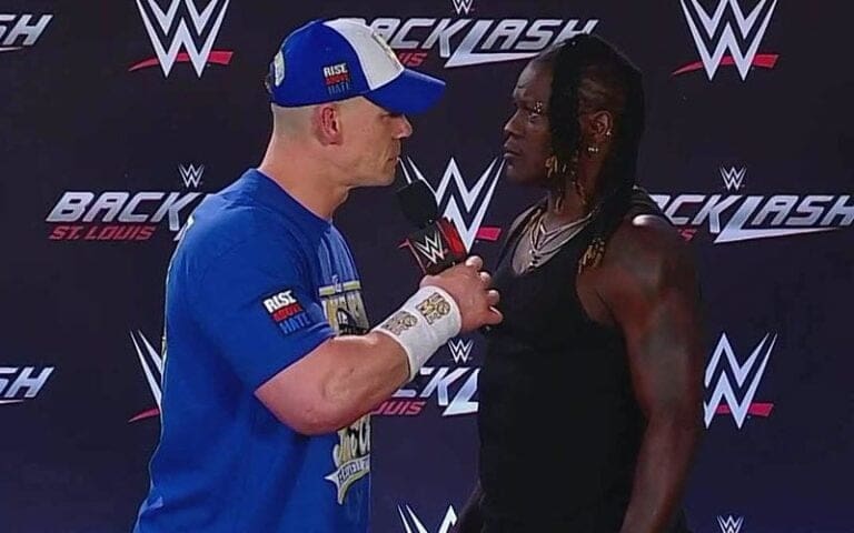 John Cena Attacks R-Truth With Attitude Adjustment During WWE Backlash Press Conference John Cena Attacks R-Truth With Attitude Adjustment During WWE Backlash Press Conference