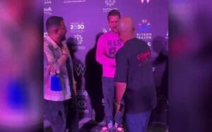 CM Punk Tells Fan to Take Off Roman Reigns Shirt After Landing in Saudi Arabia CM Punk Tells Fan to Take Off Roman Reigns Shirt After Landing in Saudi Arabia