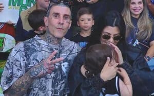 Travis Barker and Kourtney Kardashian Spotted Ringside at WWE Money in the Bank Travis Barker and Kourtney Kardashian Spotted Ringside at WWE Money in the Bank