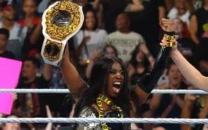 Naomi Cashes In Money in the Bank To Win WWE Women’s World Title At Evolution Naomi Cashes In Money in the Bank To Win WWE Women's World Title At Evolution
