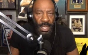 Booker T Reveals WWE Had to Pay Off Fan He Punched at House Show