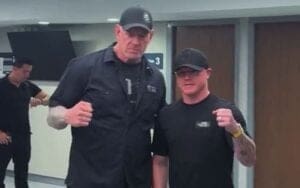 Canelo Alvarez Poses with The Undertaker Backstage at AAA Guerra de Titanes