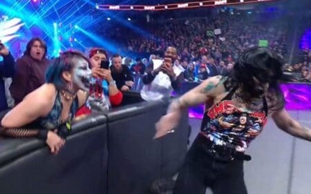 Rhea Ripley Blinded by Mist as Kabuki Warriors Launch Vicious Attack During December 15 WWE RAW Rhea Ripley Blinded by Mist as Kabuki Warriors Launch Vicious Attack During December 15 WWE RAW